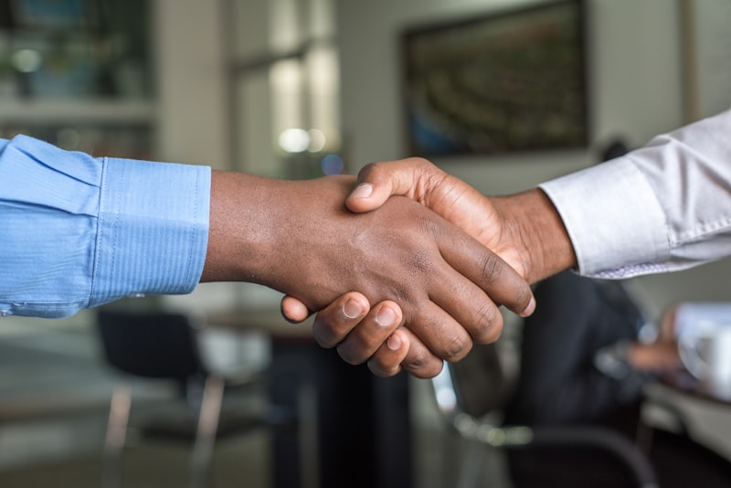 Handshake representing trust and partnership with DUI-Help